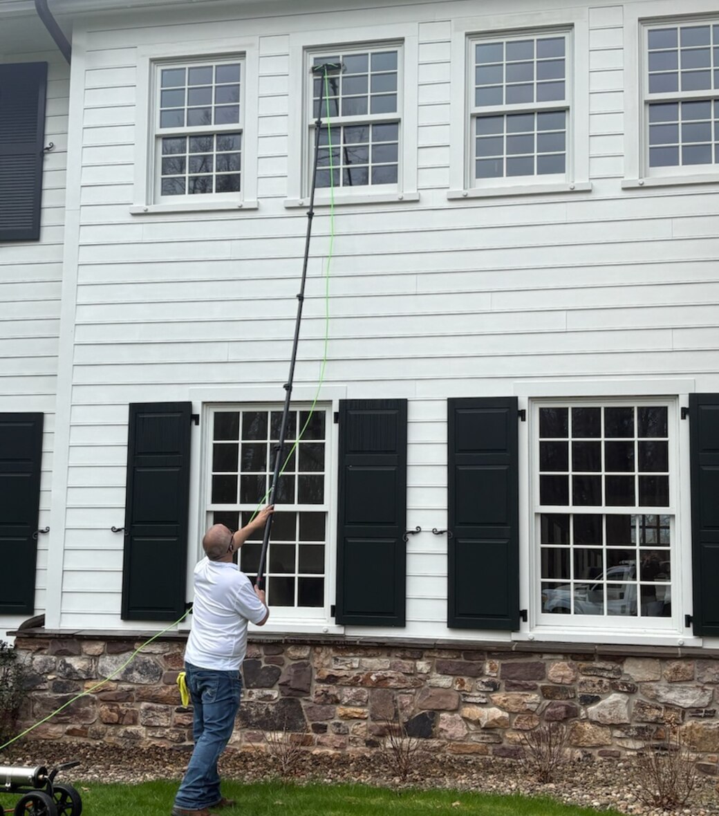 The Lion Window Cleaning crew at work on a State College, PA home